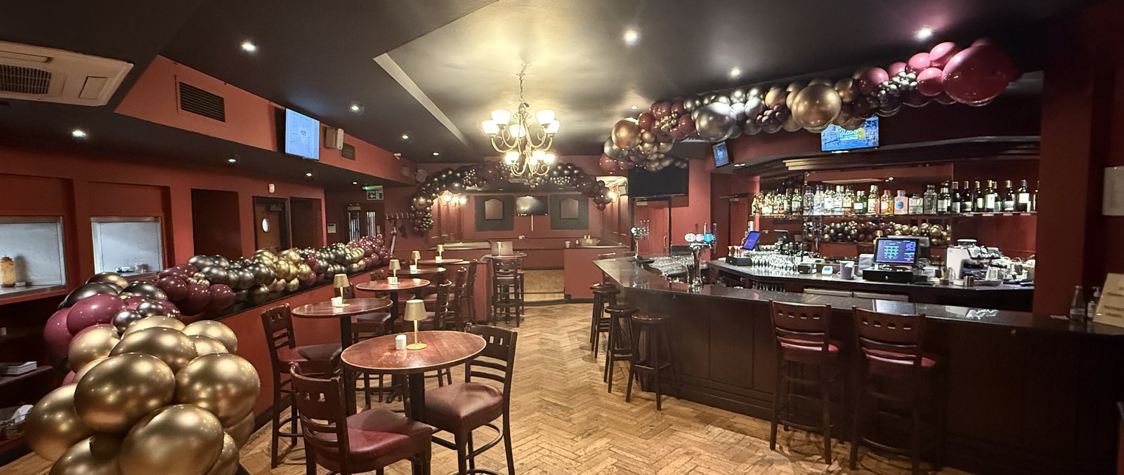Steam Wine Bar interior, the full venue set for an evening, bar to stage, candlelit and atmospheric